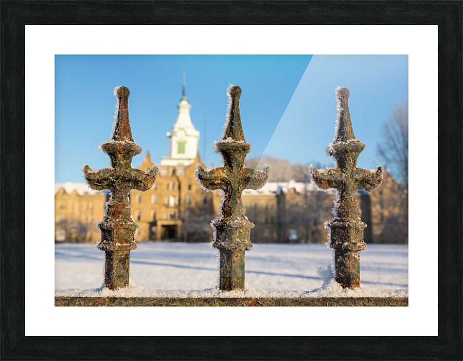 Railings in snow outside Lunatic Asylum Picture Frame print