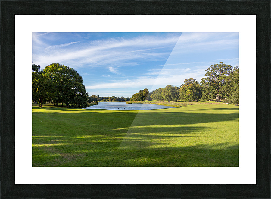 English lawn running down to lake Picture Frame print