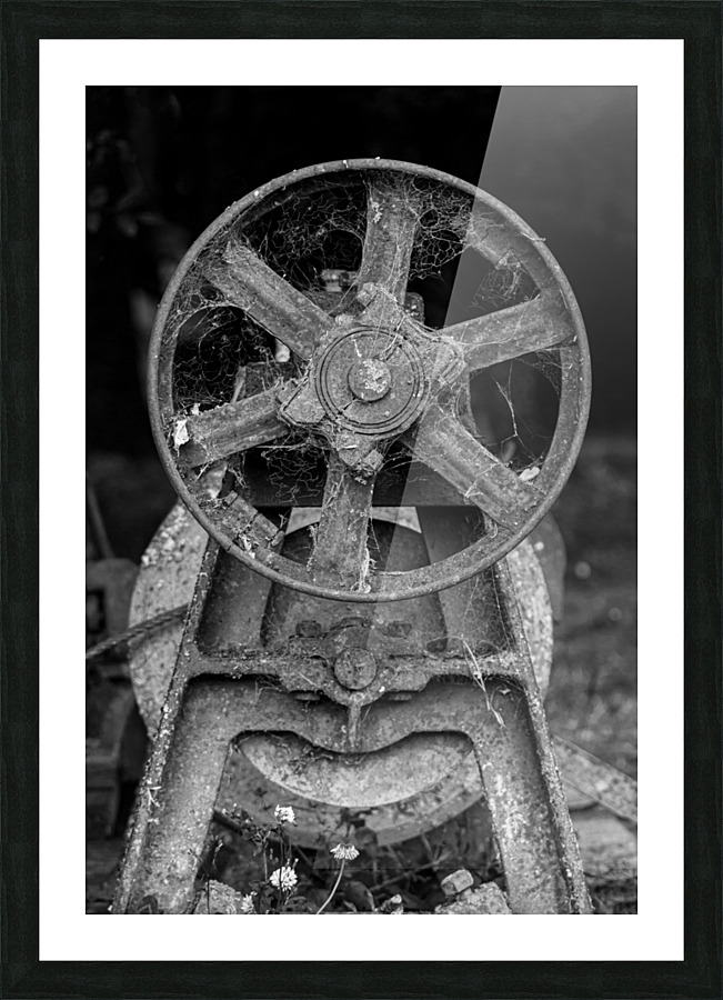 Rusty farm machinery with flywheel Picture Frame print