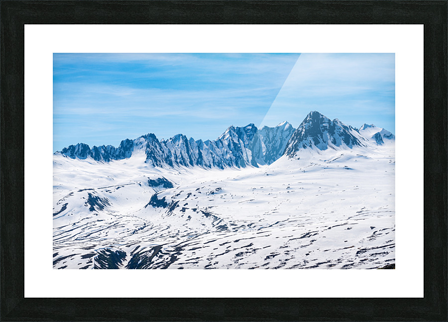Majestic mountains of Thompson Pass rise over trees Picture Frame print