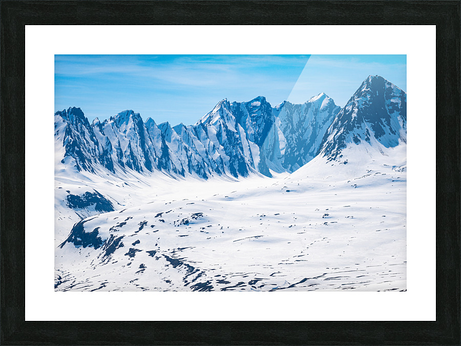Majestic mountains of Thompson Pass rise over trees Picture Frame print