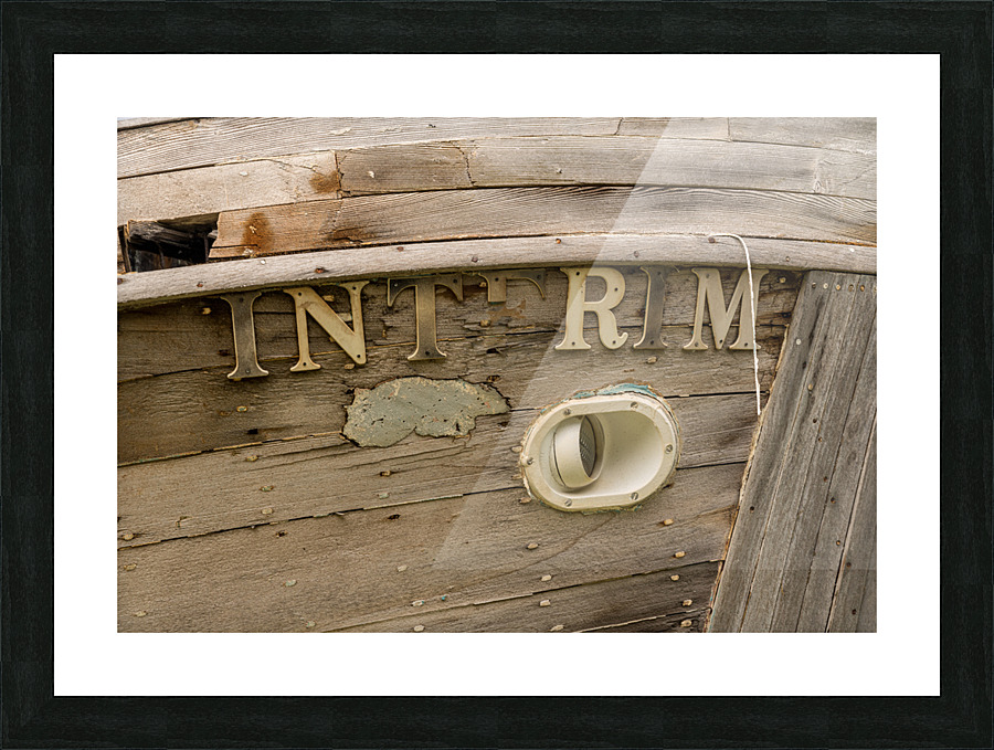 Detail of abandoned fishing boat by ocean at Icy Strait Point Picture Frame print