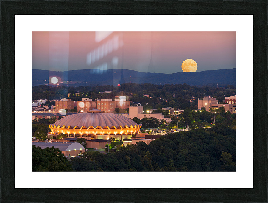 Moon rising above the Coliseum at WVU Impression et Cadre photo