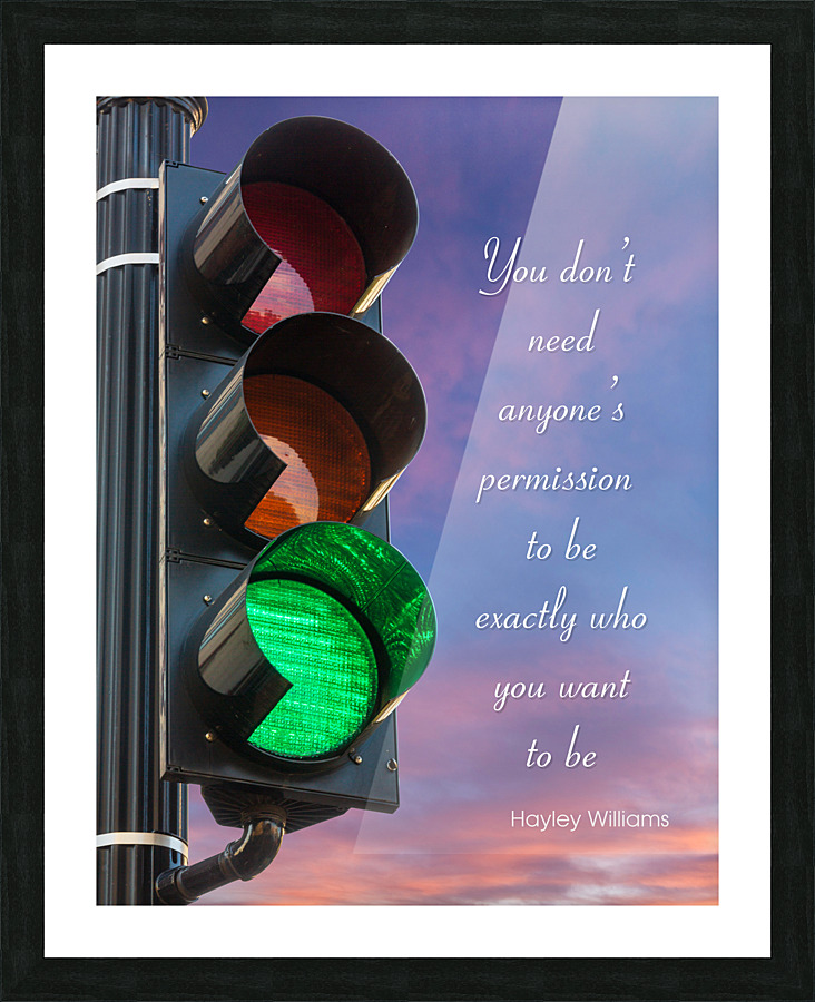 Green light on traffic signal against sunrise as concept Picture Frame print