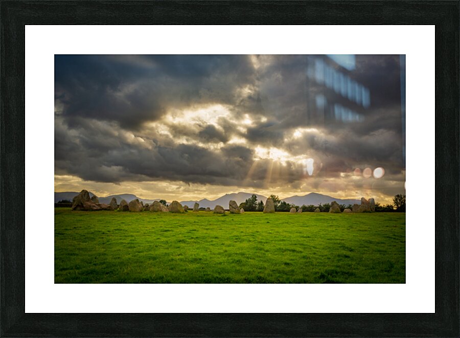 Stormy clouds over Castlerigg Stone Circle near Keswick Picture Frame print