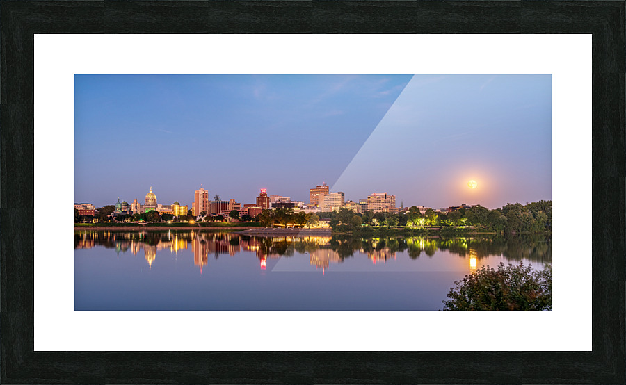 Harvest moon above the city skyline of Harrisburg in Pennsylvani Picture Frame print