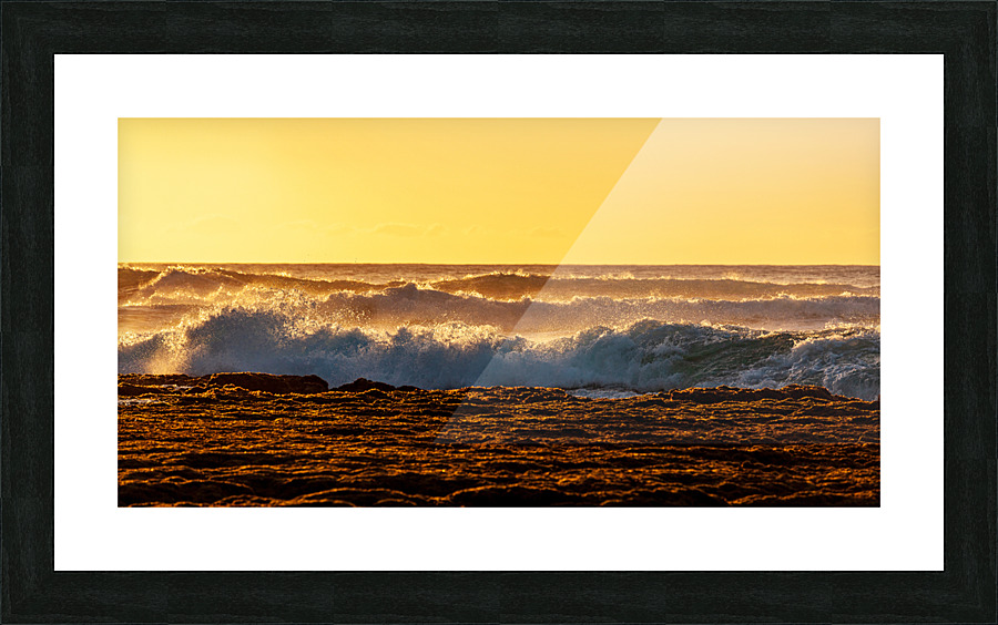 Setting sun lights crashing waves Picture Frame print
