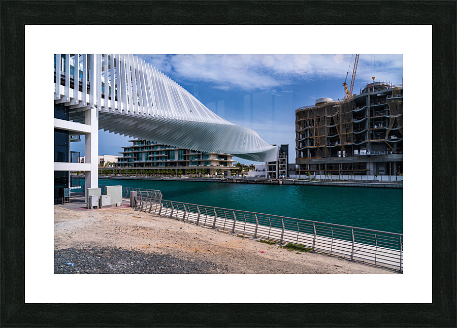 Dubai Water Canal bridge twists towards new apartment blocks Picture Frame print