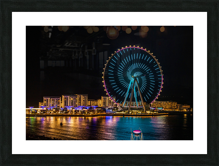Light show on Ain Dubai observation wheel at sunset Picture Frame print
