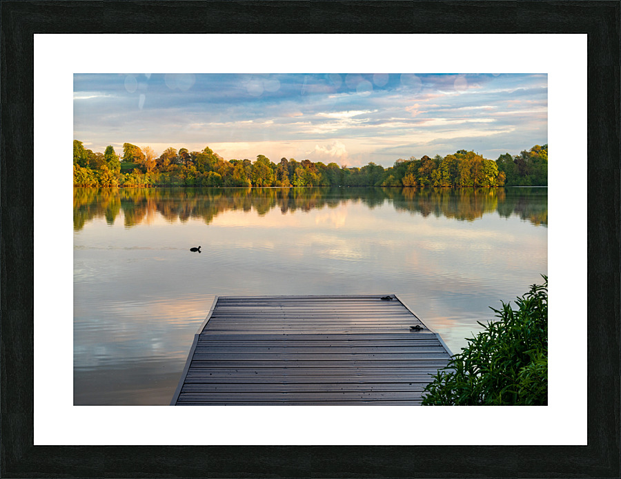 View across the Ellesmere Mere to a clear reflection of distant  Picture Frame print