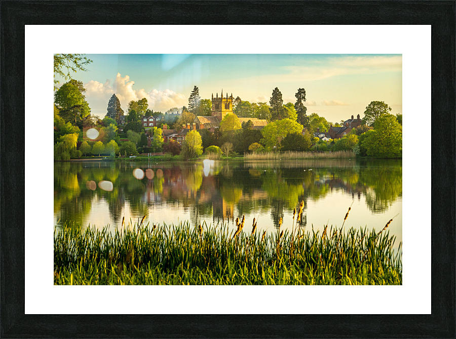 View across the Mere to the town of Ellesmere in Shropshire Picture Frame print