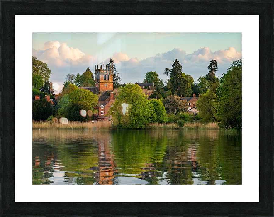 View across the Mere to the town of Ellesmere in Shropshire  Framed Print Print
