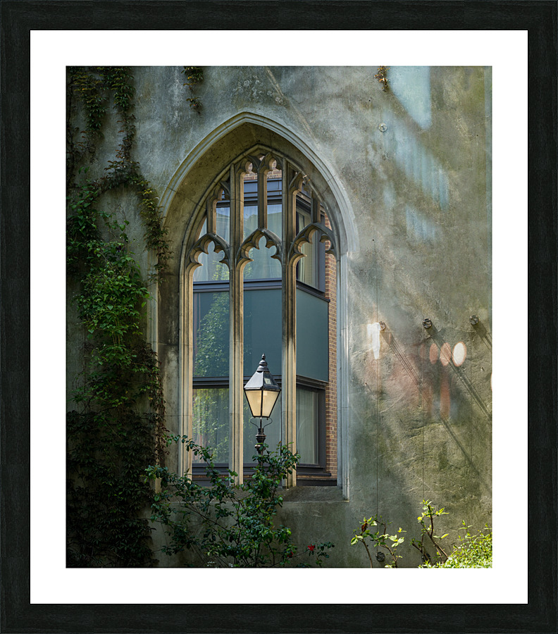 London street light seen through old windows of St Dunstan Picture Frame print