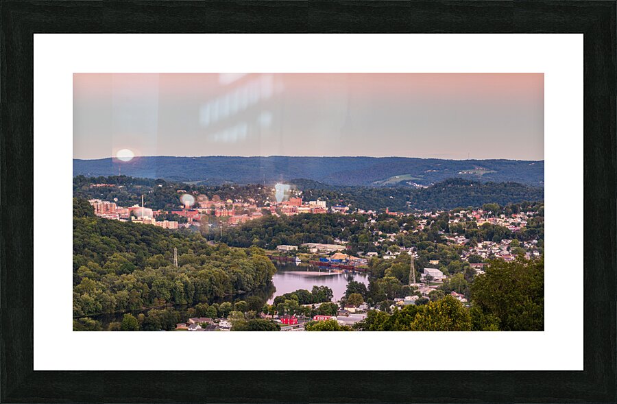 Sunset lights the sky above Morgantown in West Virginia Picture Frame print