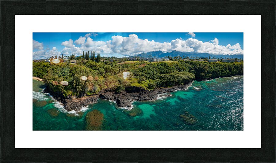 Rugged coastline of Sealodge beach in Princeville on Kauai Picture Frame print