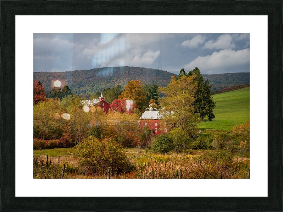 Historic red barn and farm nestled in fall colors in West Virgin Picture Frame print