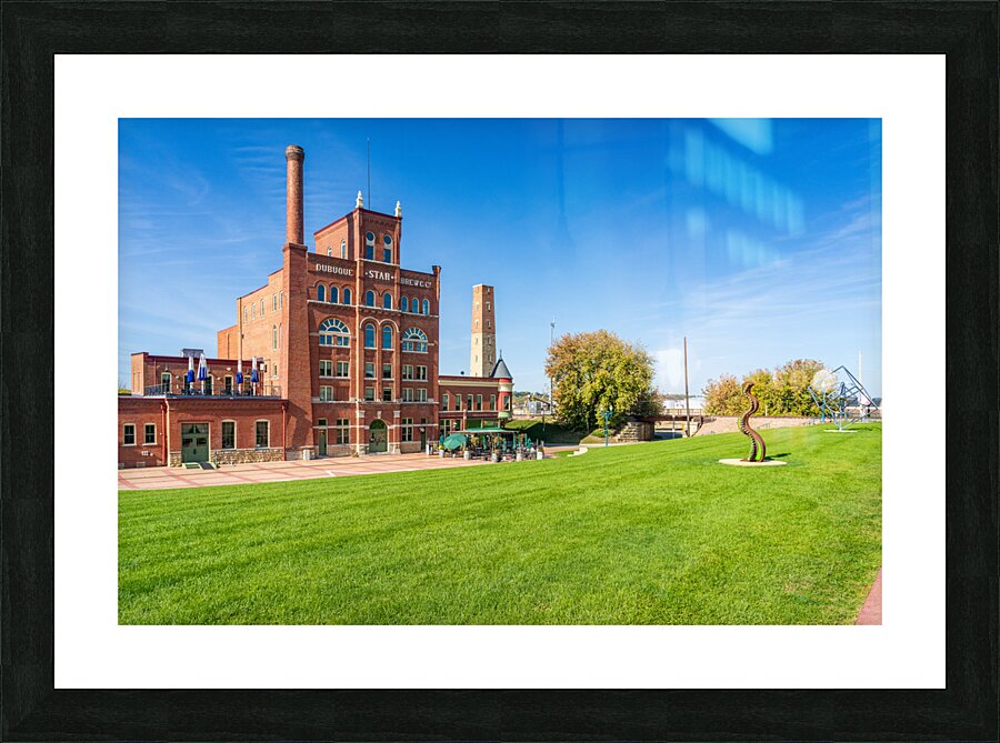 Historic Dubuque Star Brewery alongside Mississippi river Picture Frame print