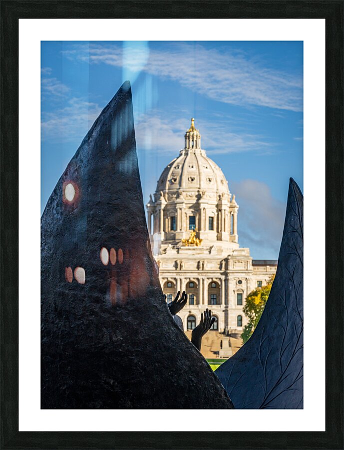 Facade of the State Capitol building in St Paul behind hands Picture Frame print