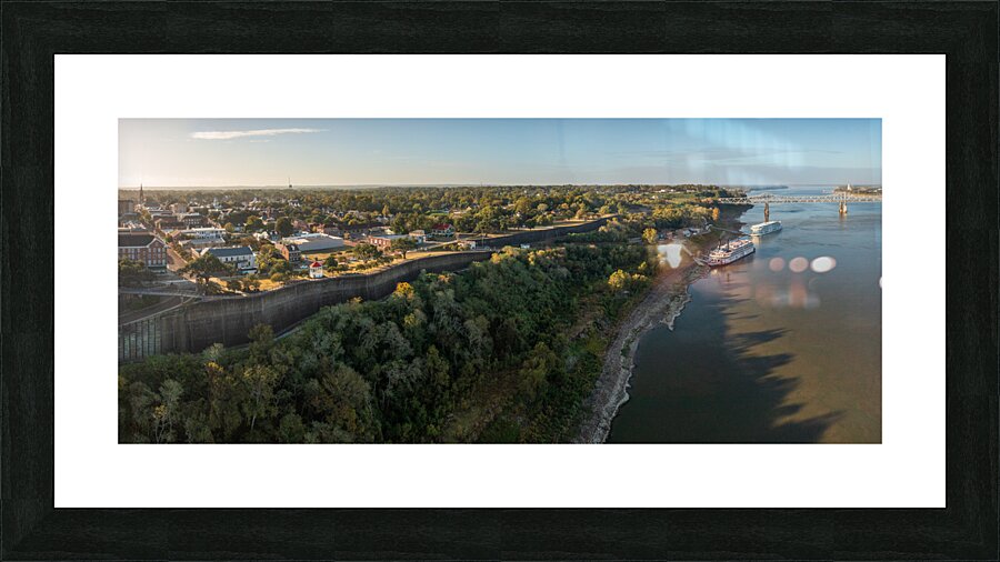Modern and old river cruise boats docked in Natchez Mississippi Picture Frame print