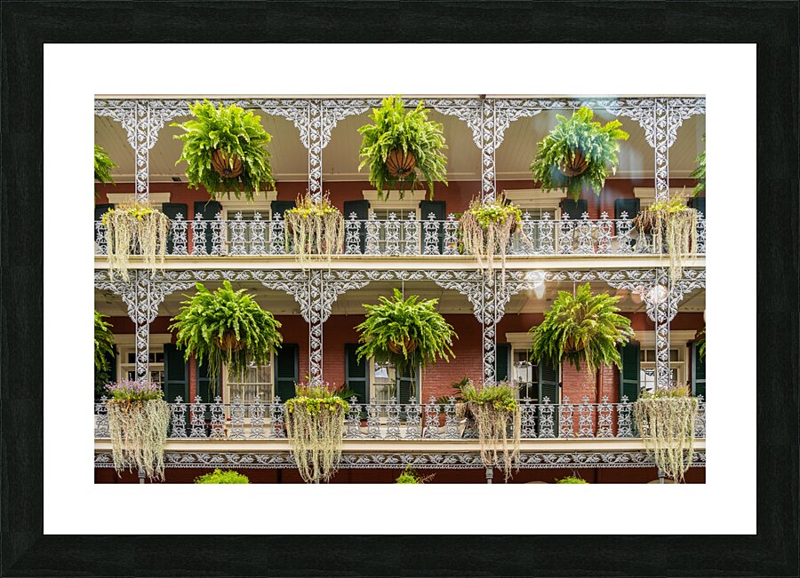 Traditional wrought iron balcony on brick New Orleans house Picture Frame print