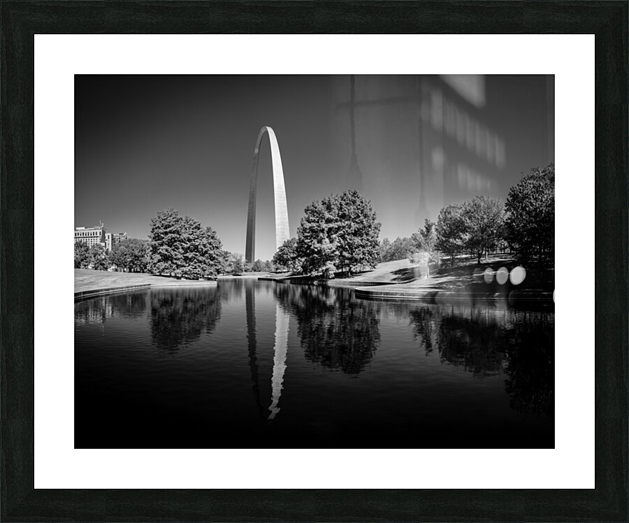Monochrome Gateway Arch of St Louis Missouri reflecting in the l Picture Frame print