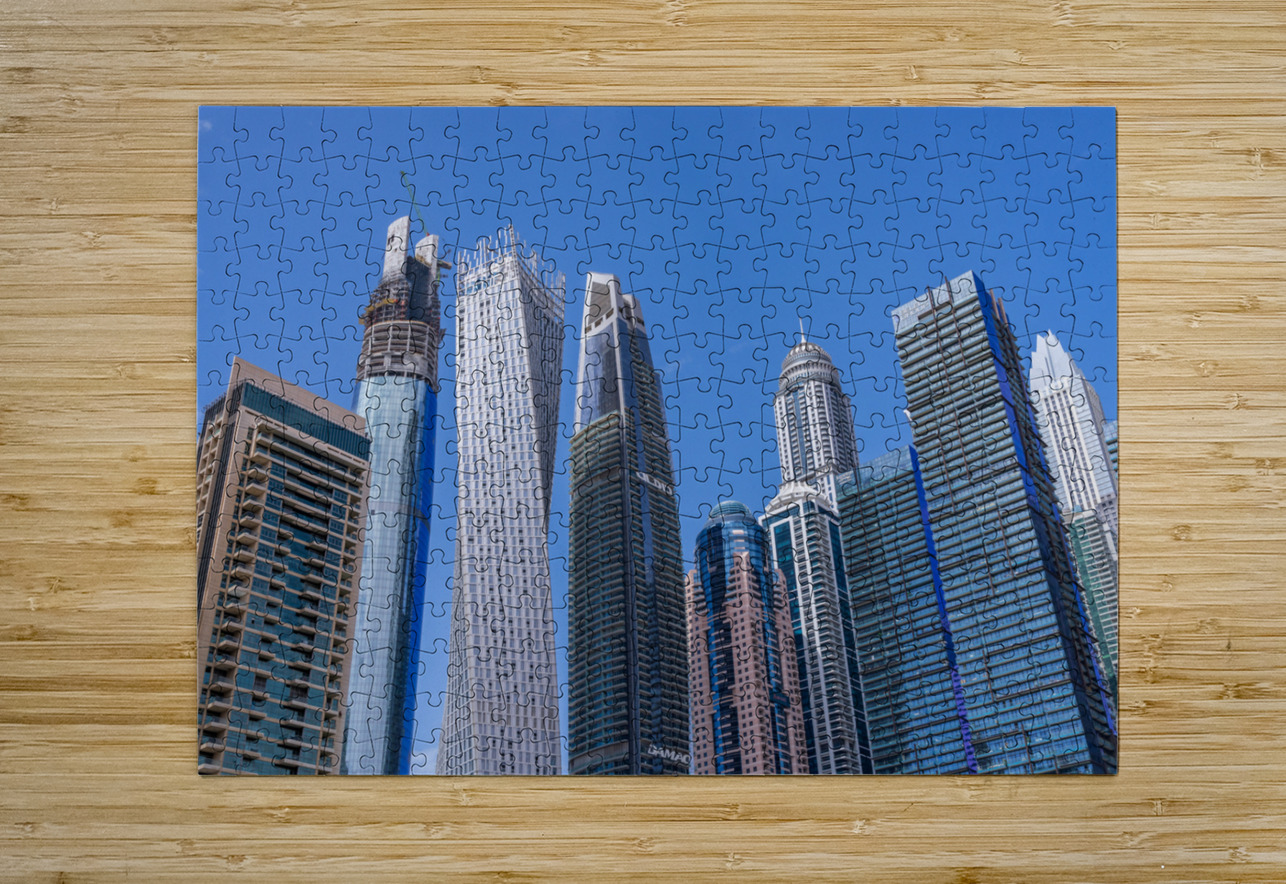Cayan Tower among tall buildings on waterfront at Dubai Marina Steve Heap Puzzle printing