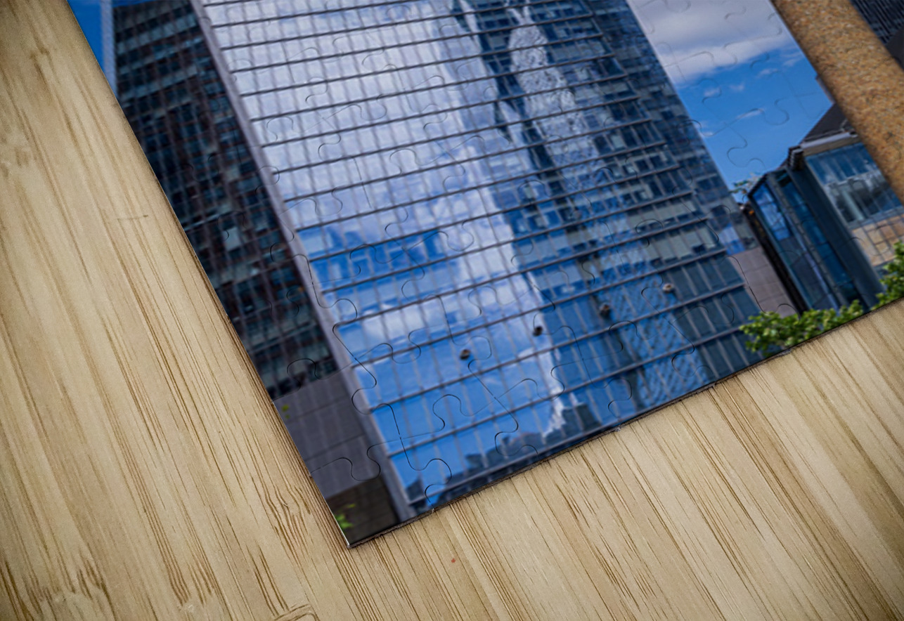 Looking up at modern buildings by brick chimney in Hudson Yards Steve Heap Puzzle