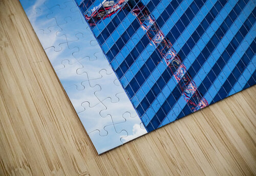 Reflection of crane in Chicago windows Steve Heap puzzle