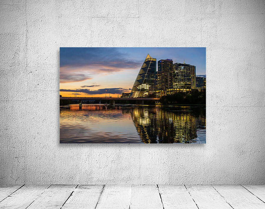 Sail like building with modern office blocks in Austin Texas sky Wall Preview