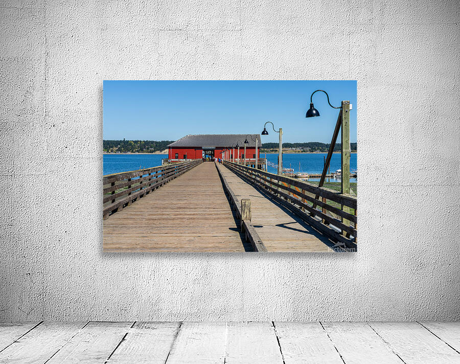 Wooden pier leading to famous red Coupeville wharf on Whidbey Is Wall Preview