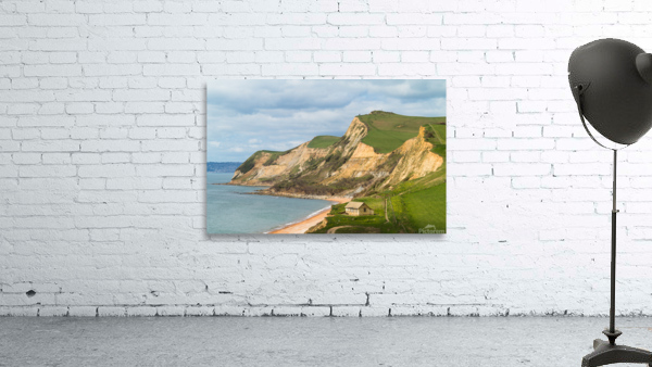 Cottage by cliffs at West Bay Dorset in UK Wall Preview