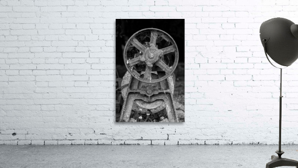 Rusty farm machinery with flywheel Wall Preview