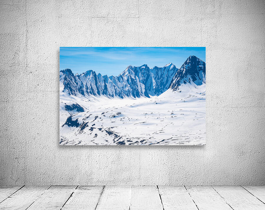 Majestic mountains of Thompson Pass rise over trees Wall Preview