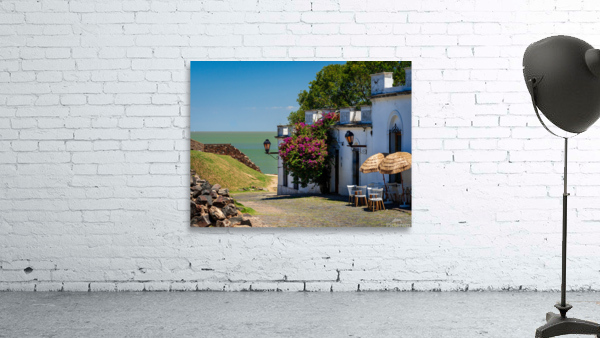 Cobbled street in Unesco historical town of Colonia del Sacramen Wall Preview