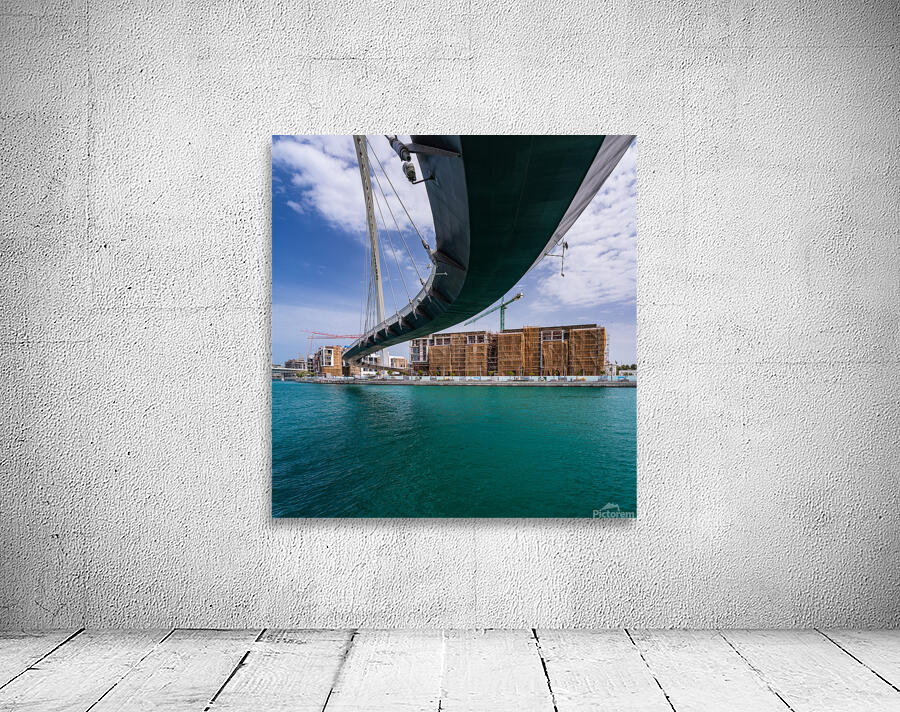 Modern apartments alongside Dubai Canal under Tolerance bridge Wall Preview