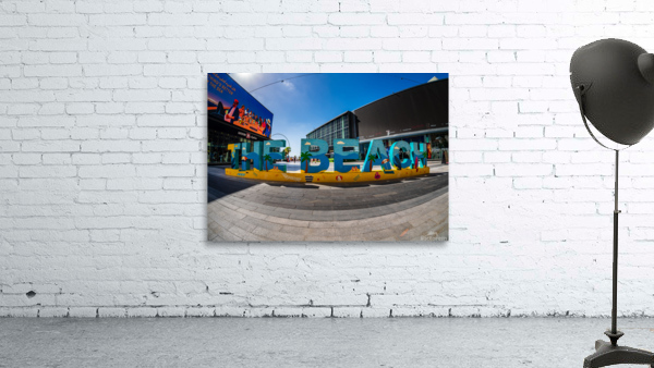 Colorful The Beach sign on main street of JBR district of Dubai Wall Preview