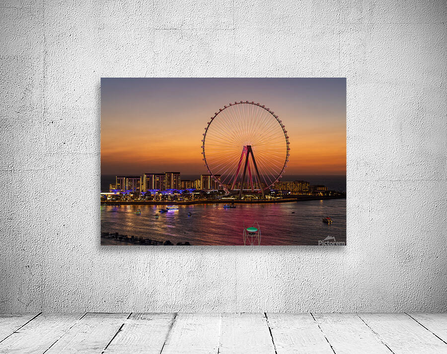 Light show on Ain Dubai observation wheel at sunset Wall Preview