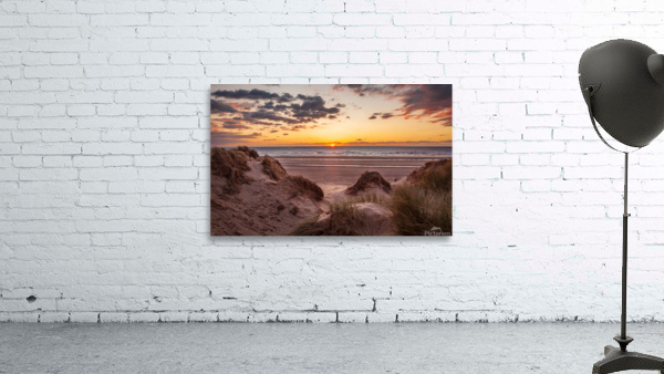 Sunset over Formby Beach through sand dunes Wall Preview