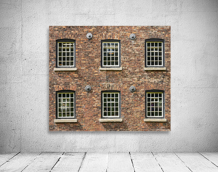 Restored industrial cotton mill with pattern of windows Wall Preview