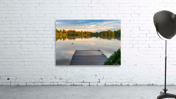 View across the Ellesmere Mere to a clear reflection of distant  Wall Preview
