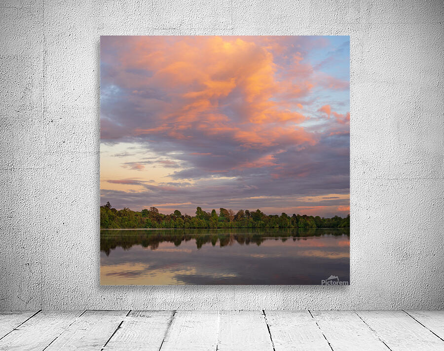 View across the Ellesmere Mere to a clear reflection of distant  Wall Preview