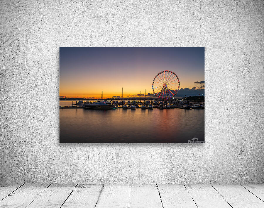 Ferris wheel at National Harbor at sunset Wall Preview
