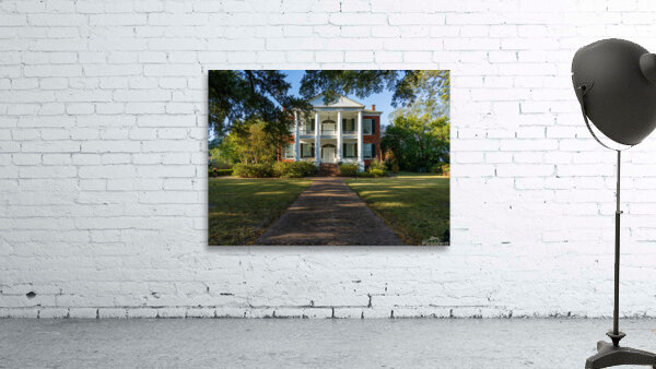 Facade of antebellum home in Natchez in Mississippi Wall Preview