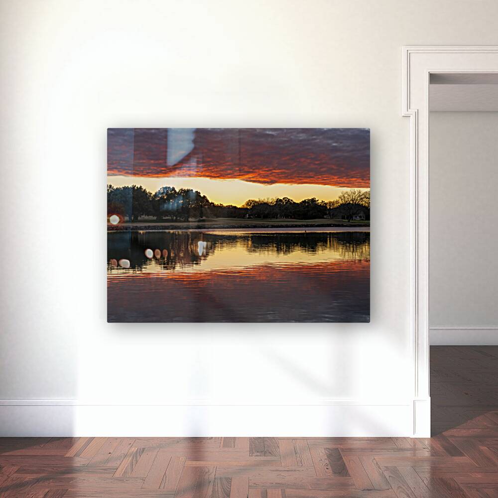 Dramatic sunset over Legacy Hills Park lake and golf course near Reproduction