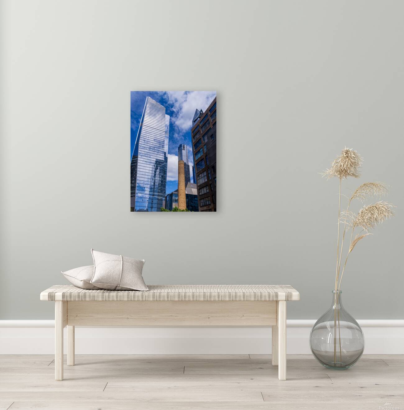 Looking up at modern buildings by brick chimney in Hudson Yards Reproduction
