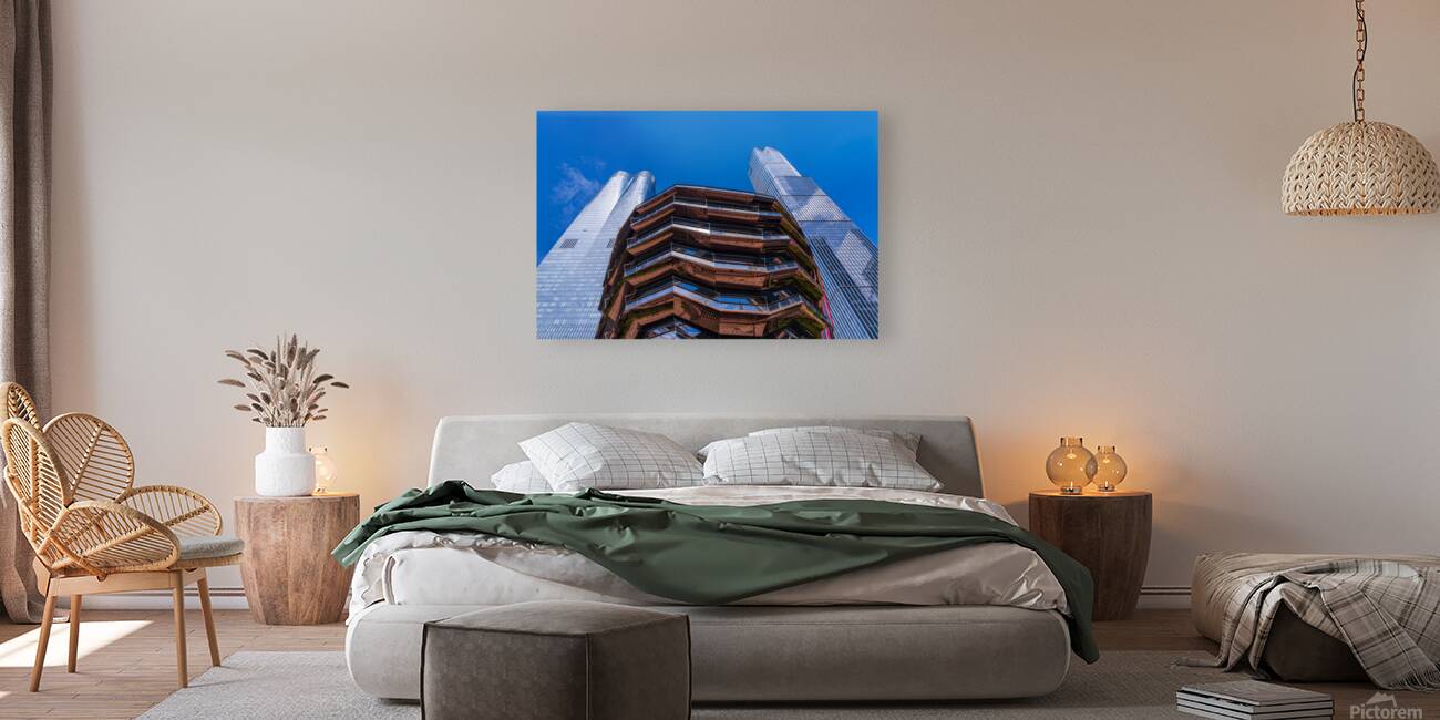 Reflective surface of the Vessel with a skyscraper behind with c Reproduction