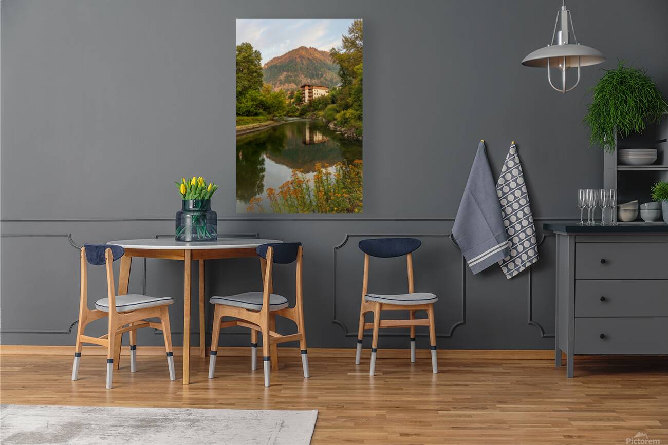 Alpine German apartment building relfects in River Wenatchee in  Reproduction