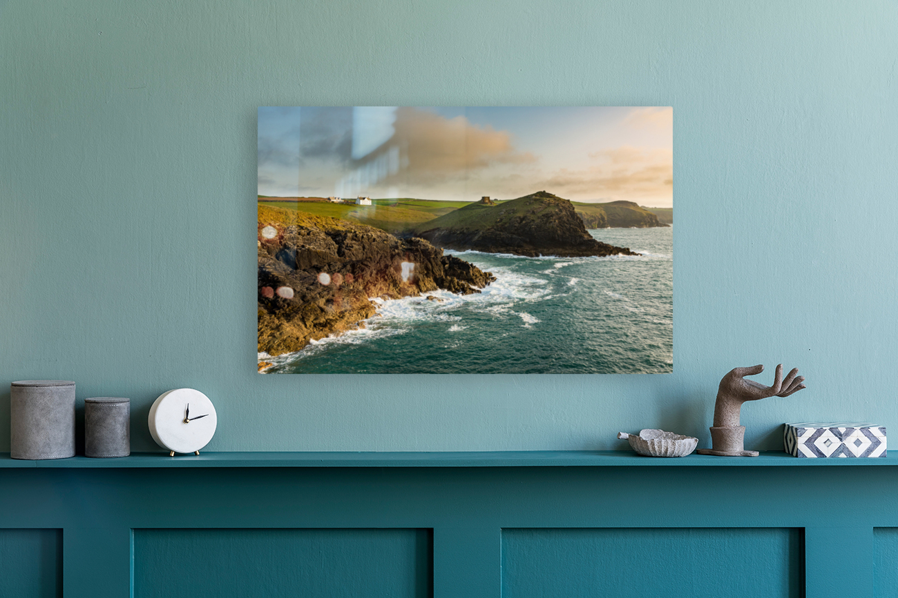 Coastline in late evening sun at Port Quin Reproduction
