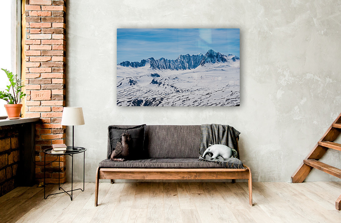 Majestic mountains of Thompson Pass rise over trees Reproduction