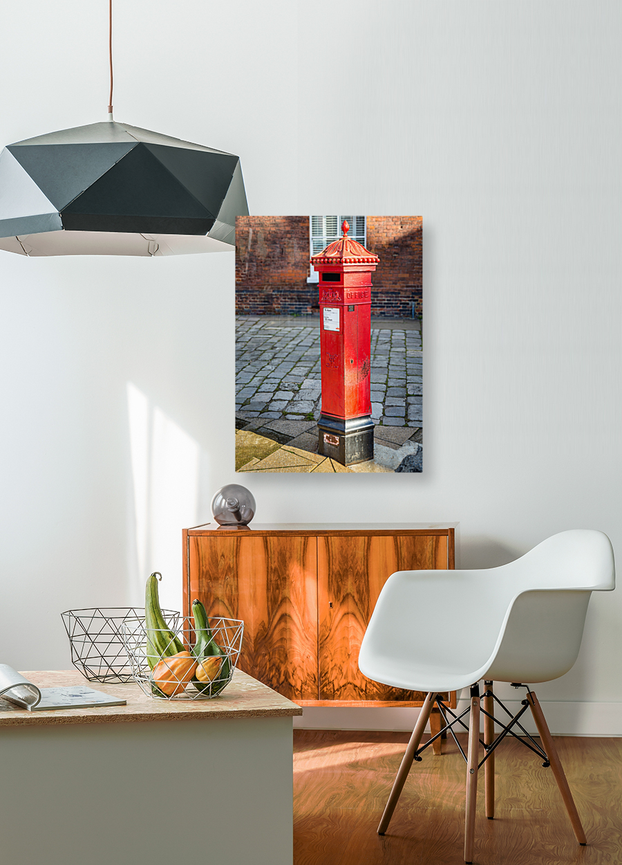 Victoria era red post office mailbox in street Reproduction